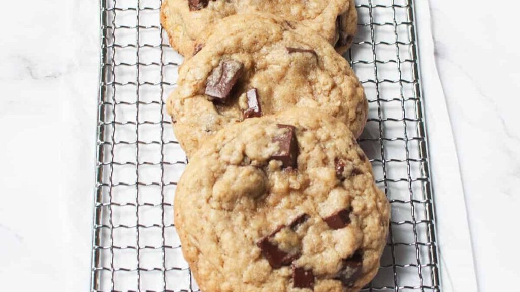 chocolate chunk cookies on a cooling rack