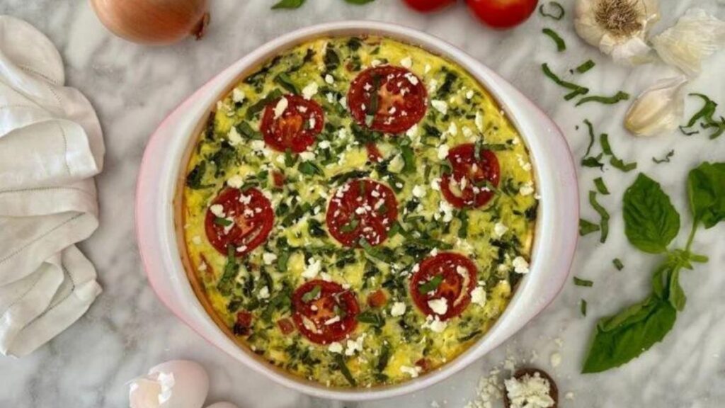 a quiche made with tomato, feta and cottage cheese