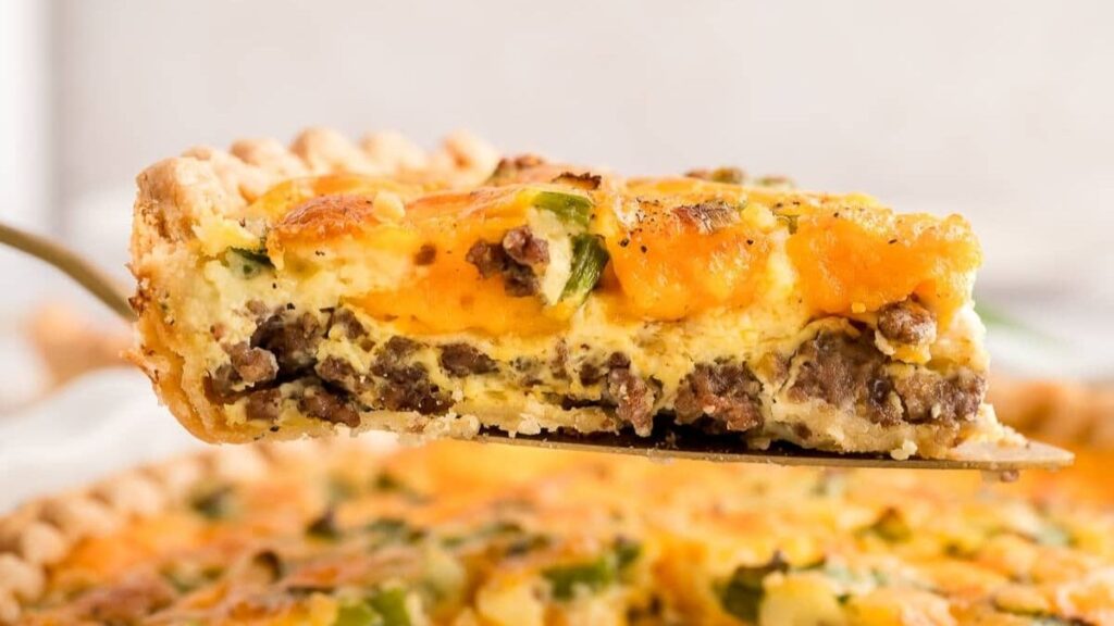 a quiche slice with hamburger filling