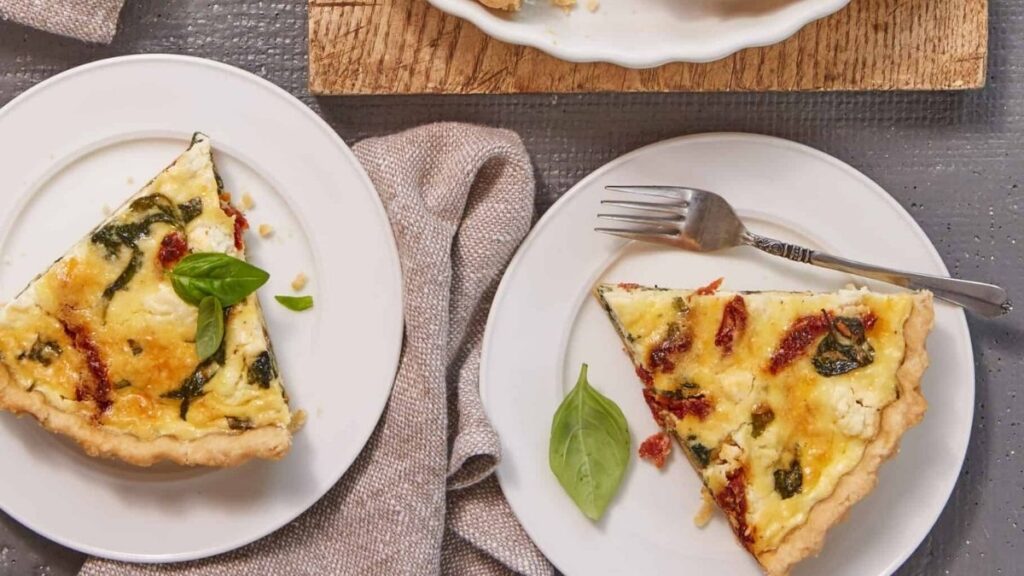 a quiche with sun dried tomato filling