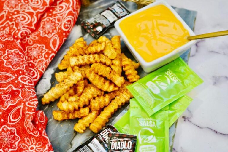 nacho fries with cheese sauce and other sauce packets